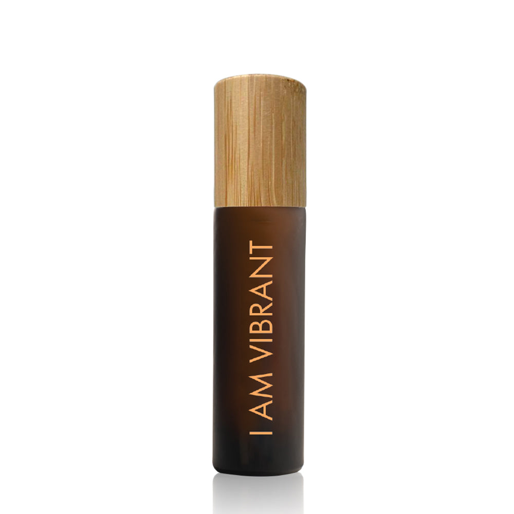 grapefruit scented oil in an amber glass bottle with bamboo lid