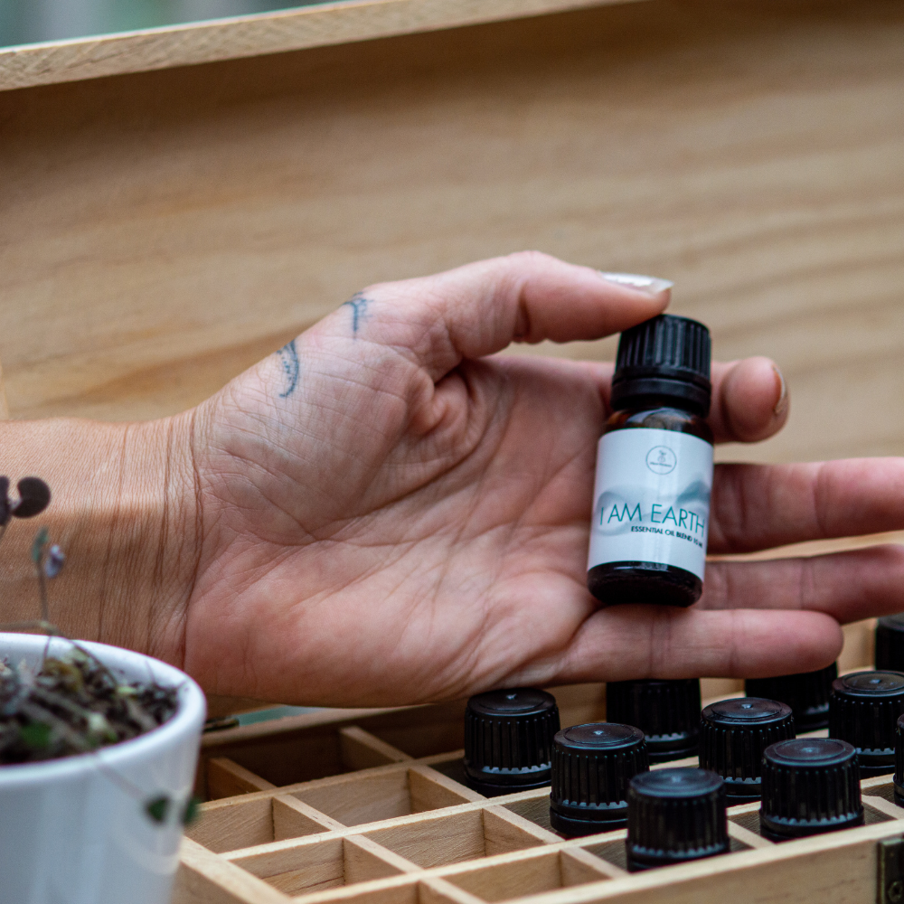 i am earth essential oil blend in a box of essential oils