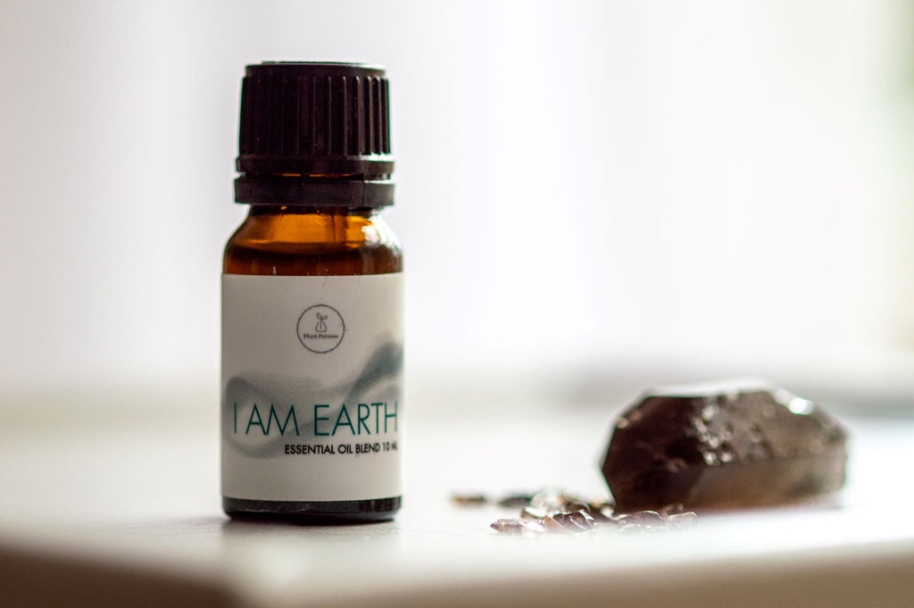 i am earth essential oil blend with smoky quart crystal